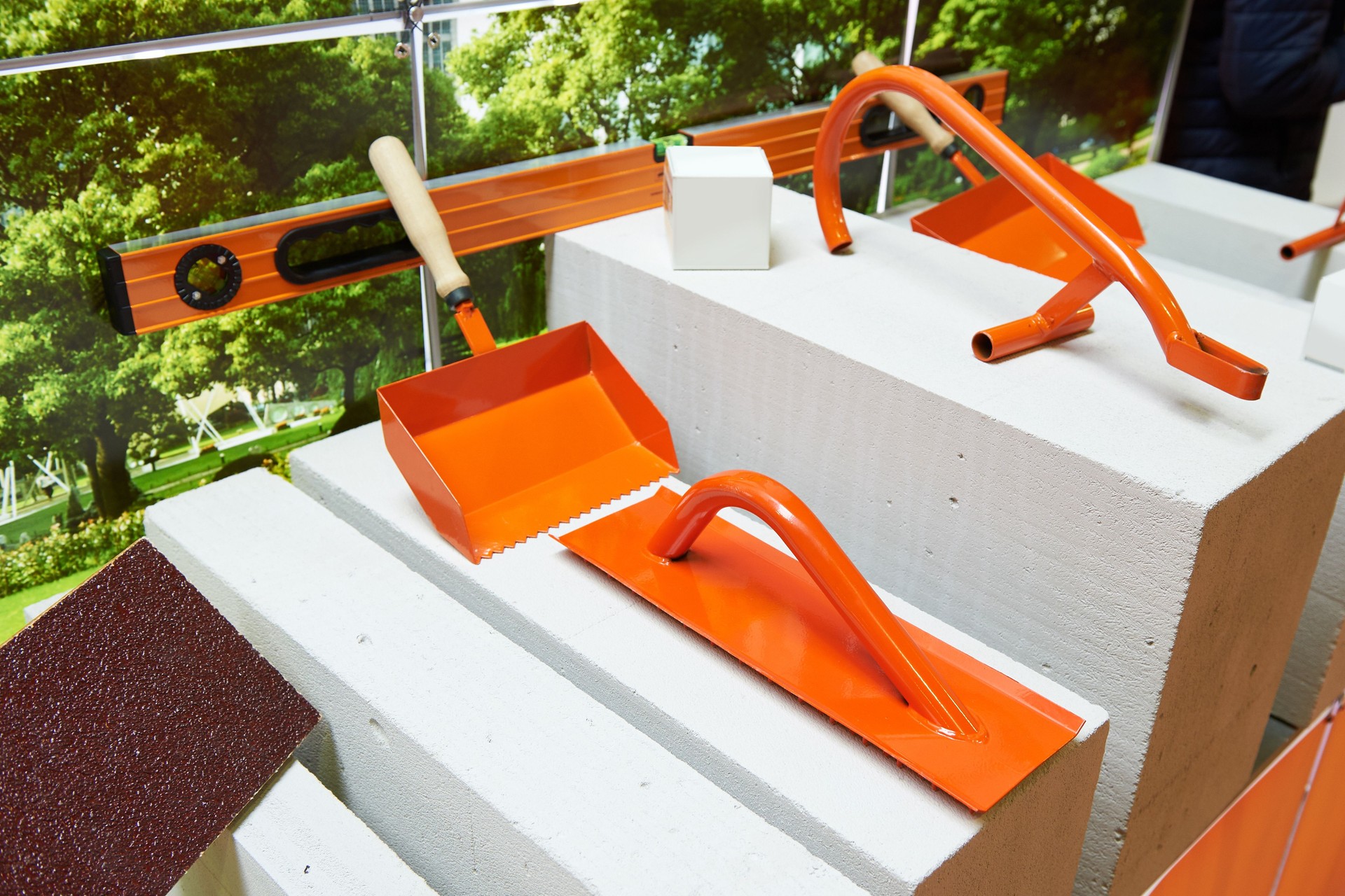 Building tools and foam concrete blocks